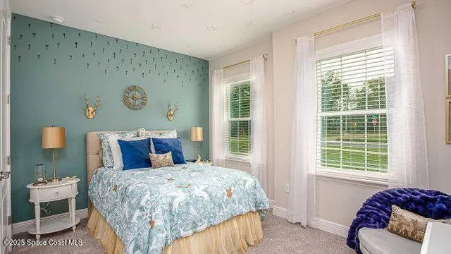 a view of a livingroom with furniture and a couch