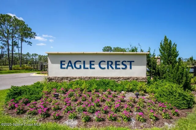a view of a swimming pool with outdoor seating
