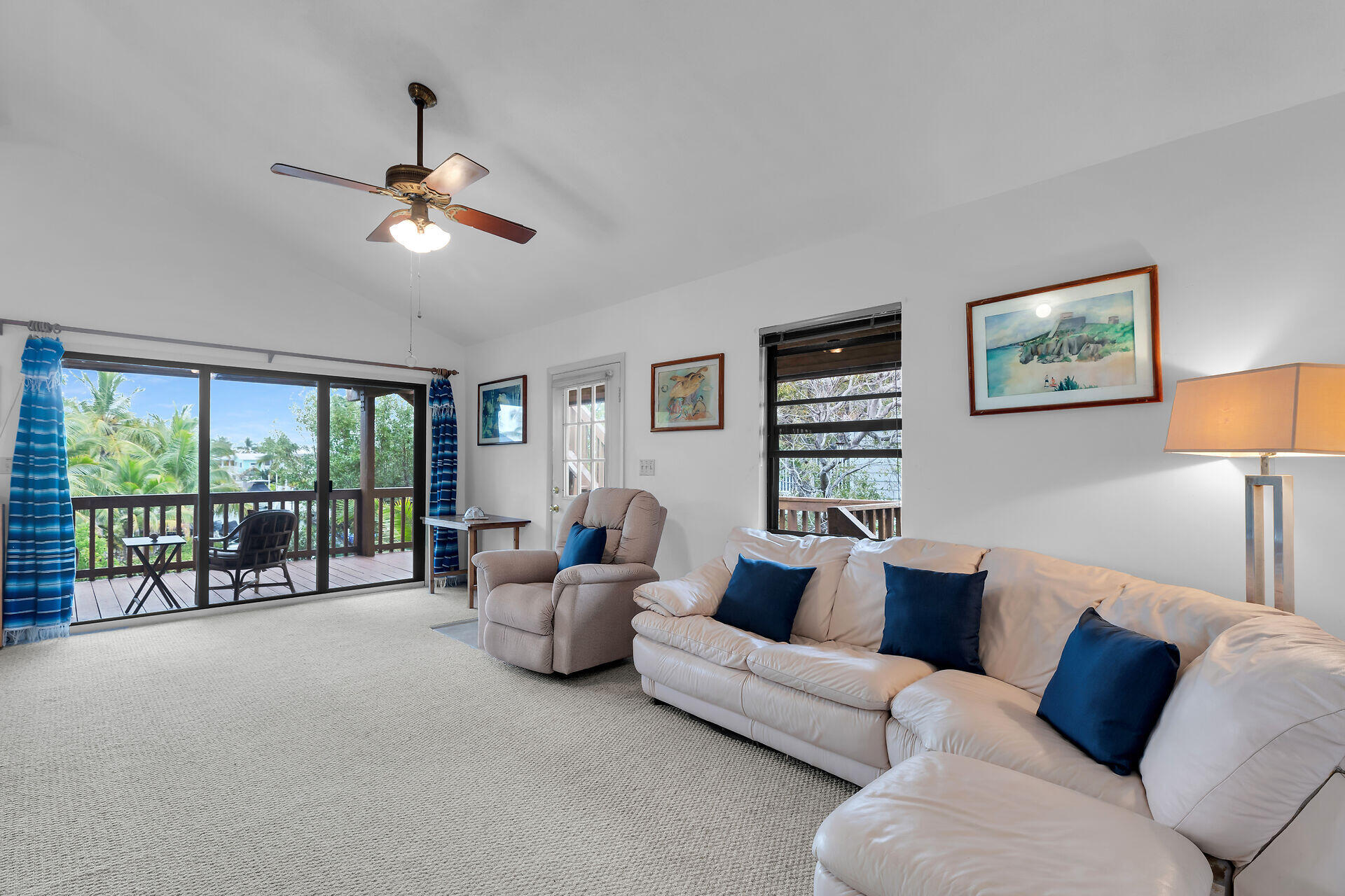683 Blackbeard Road Summerland Key, FL 33042 - Photo 11 of 49 a living room with furniture and a large window