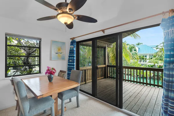 a view of house with swimming pool yard and outdoor seating