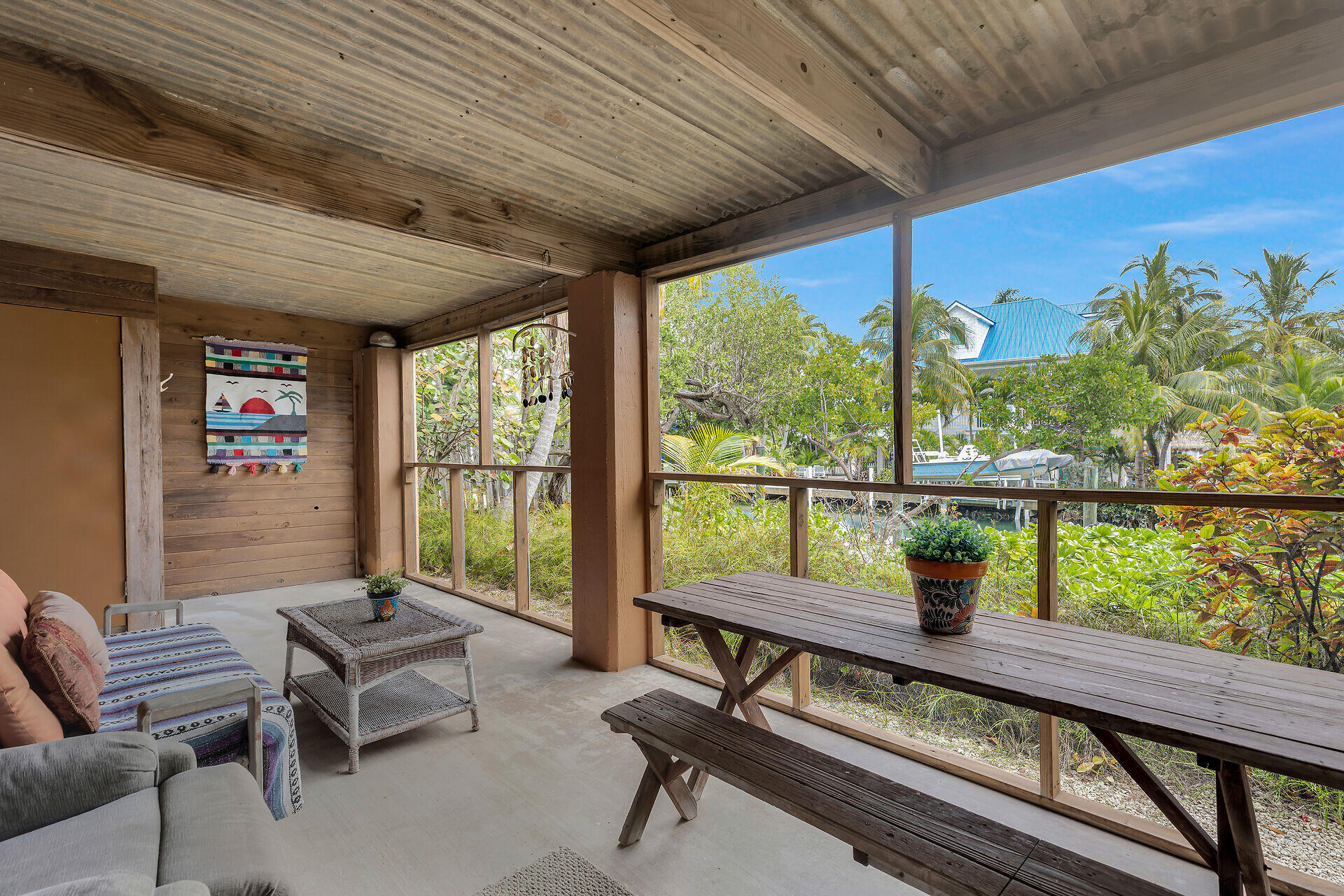 683 Blackbeard Road Summerland Key, FL 33042 - Photo 36 of 49 Downstairs screened area 1