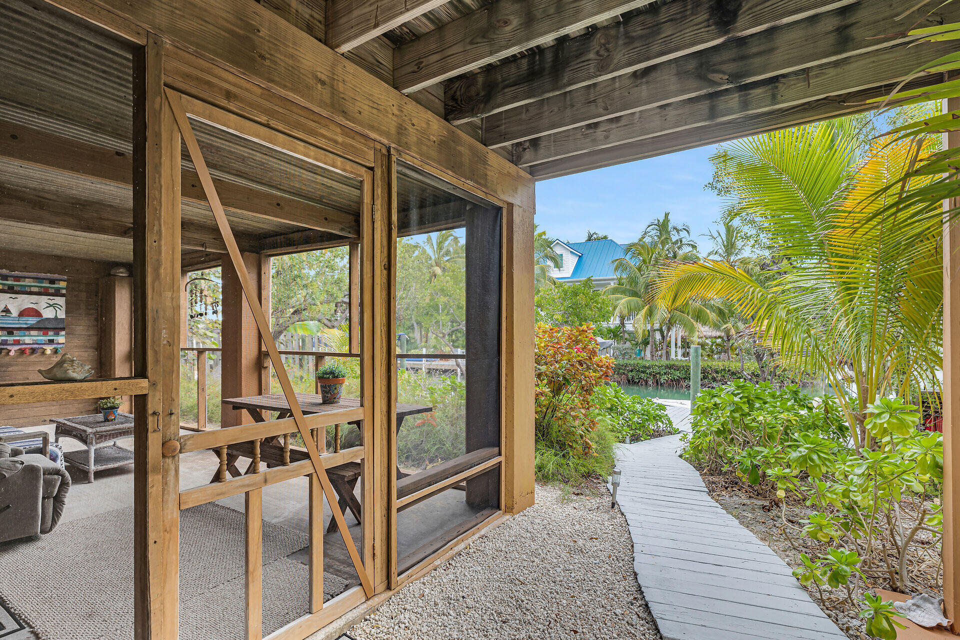 683 Blackbeard Road Summerland Key, FL 33042 - Photo 40 of 49 Screened sitting area & walkway to dock