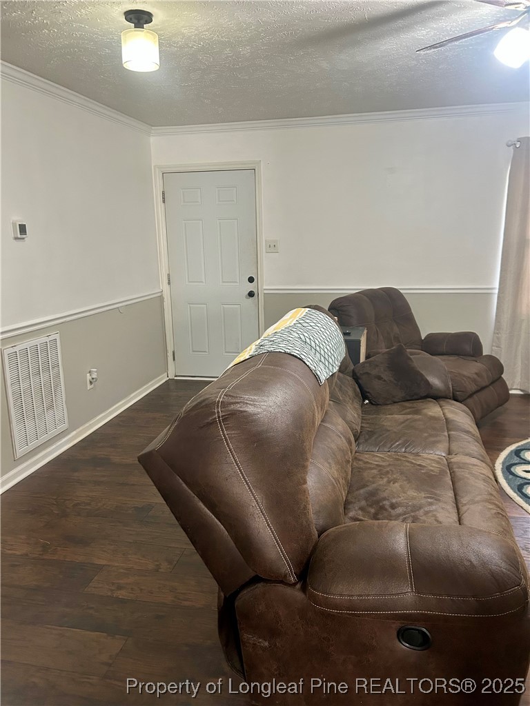 634 Dallas Road Lumberton, NC 28358 - Photo 13 of 27 a living room with a bed