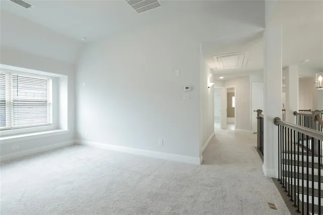 en empty room with windows