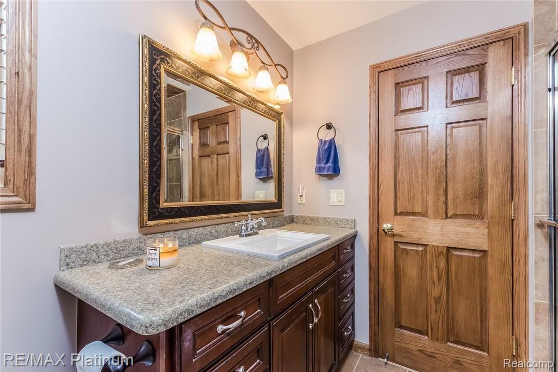 4558 North Latson Road Howell, MI 48855 - Photo 13 of 46 Master Bath has Large Standup Shower and Walk-in Closet