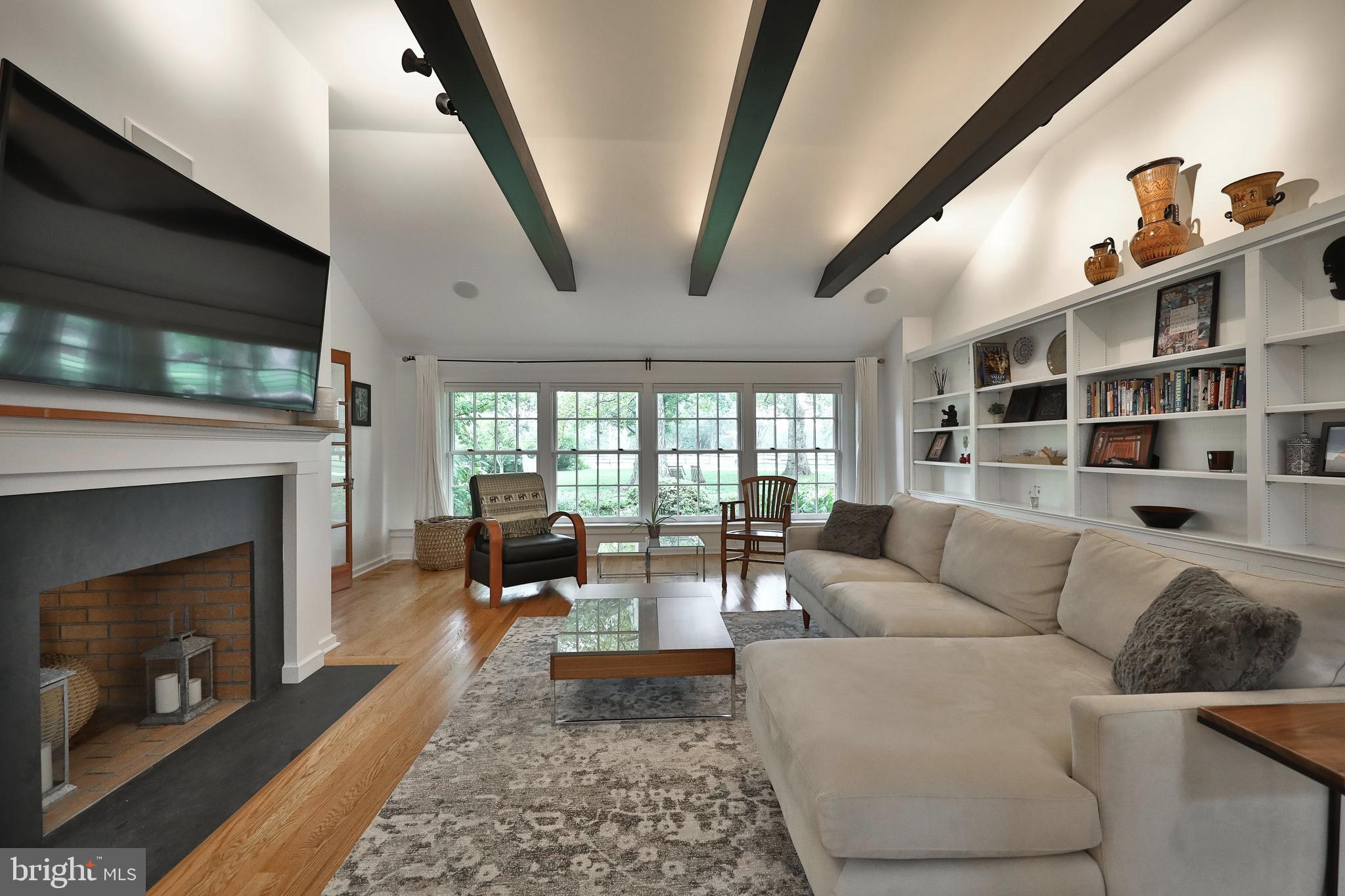 1528 Spring Mill Road Gladwyne, PA 19035 - Photo 12 of 48 Dual sided fireplace can also be enjoyed in the FR