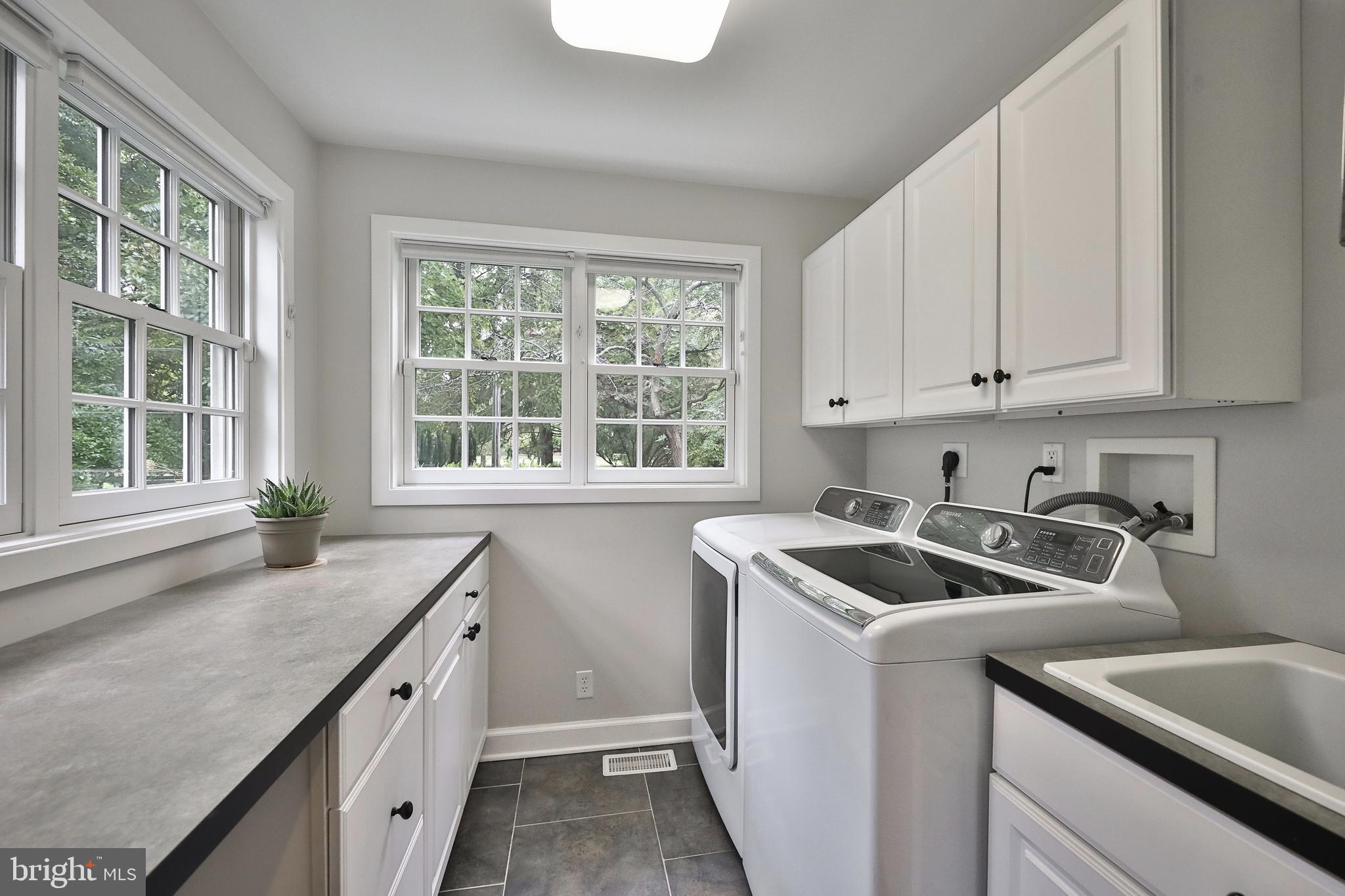 1528 Spring Mill Road Gladwyne, PA 19035 - Photo 23 of 48 Main Floor Laundry w/ loads of storage