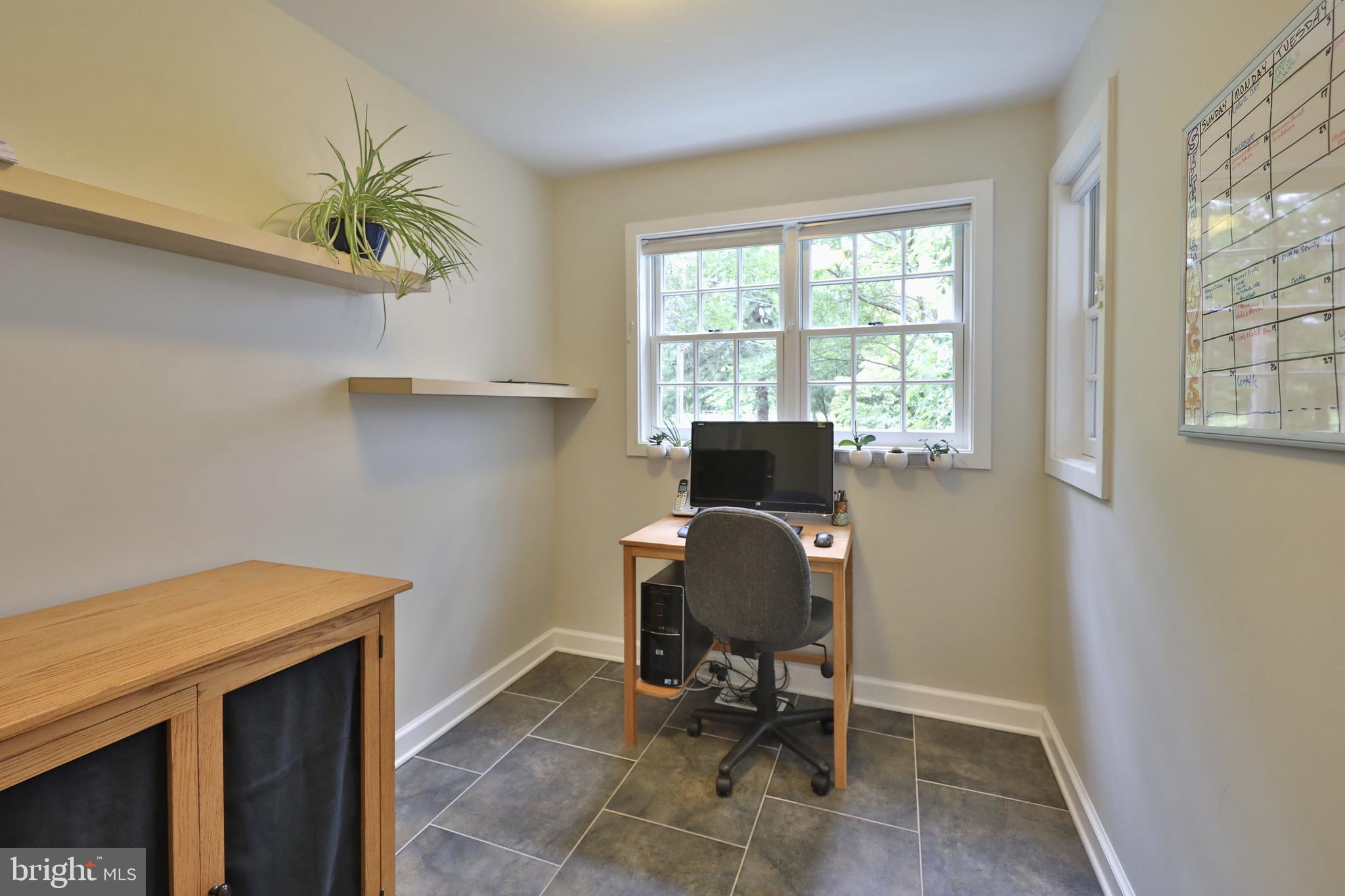 1528 Spring Mill Road Gladwyne, PA 19035 - Photo 25 of 48 Home office w/ Pocket Doors and Windows