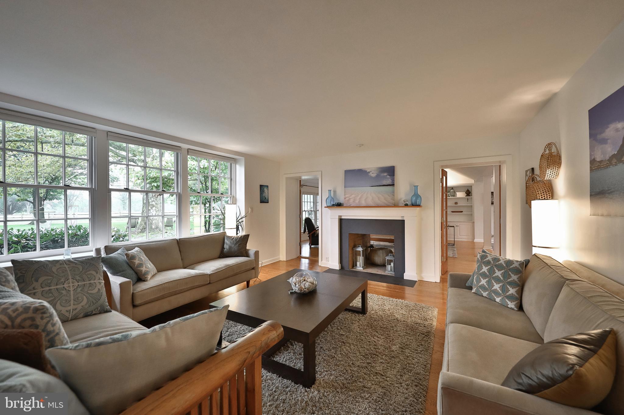 1528 Spring Mill Road Gladwyne, PA 19035 - Photo 5 of 48 Living Room w/ Dual Sided Fireplace