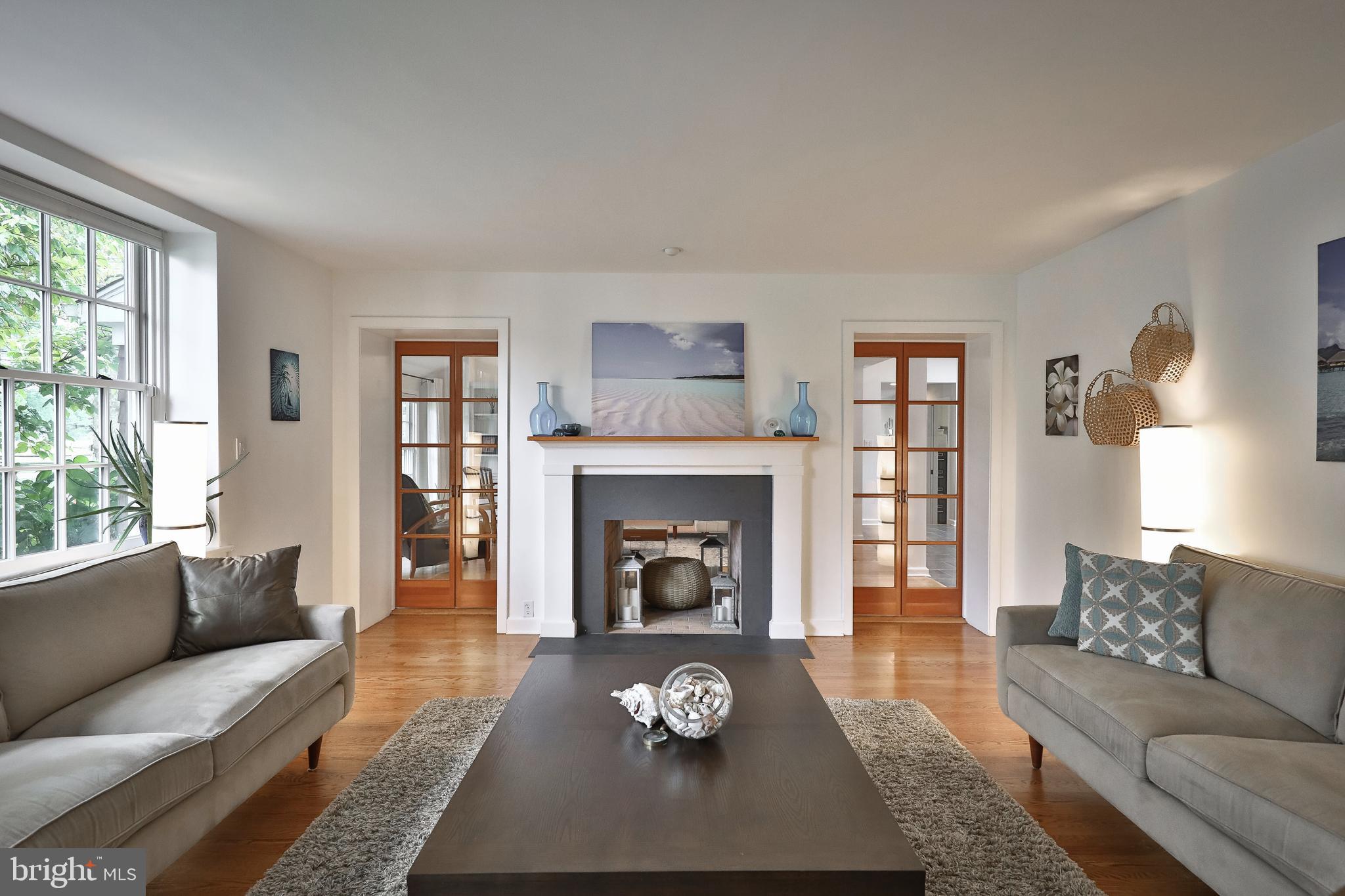 1528 Spring Mill Road Gladwyne, PA 19035 - Photo 6 of 48 Living Room w/ Glass Paneled Doors to separate FR