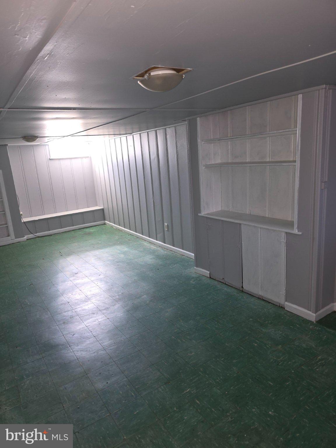 4404 Mountview Road Baltimore, MD 21229 - Photo 20 of 22 Spacious, versatile basement retreat.