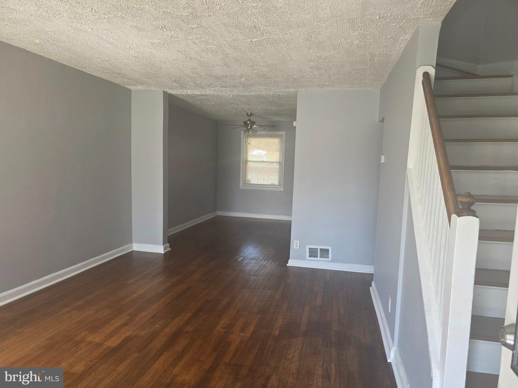 4404 Mountview Road Baltimore, MD 21229 - Photo 2 of 22 Spacious, sunlit living area awaits.