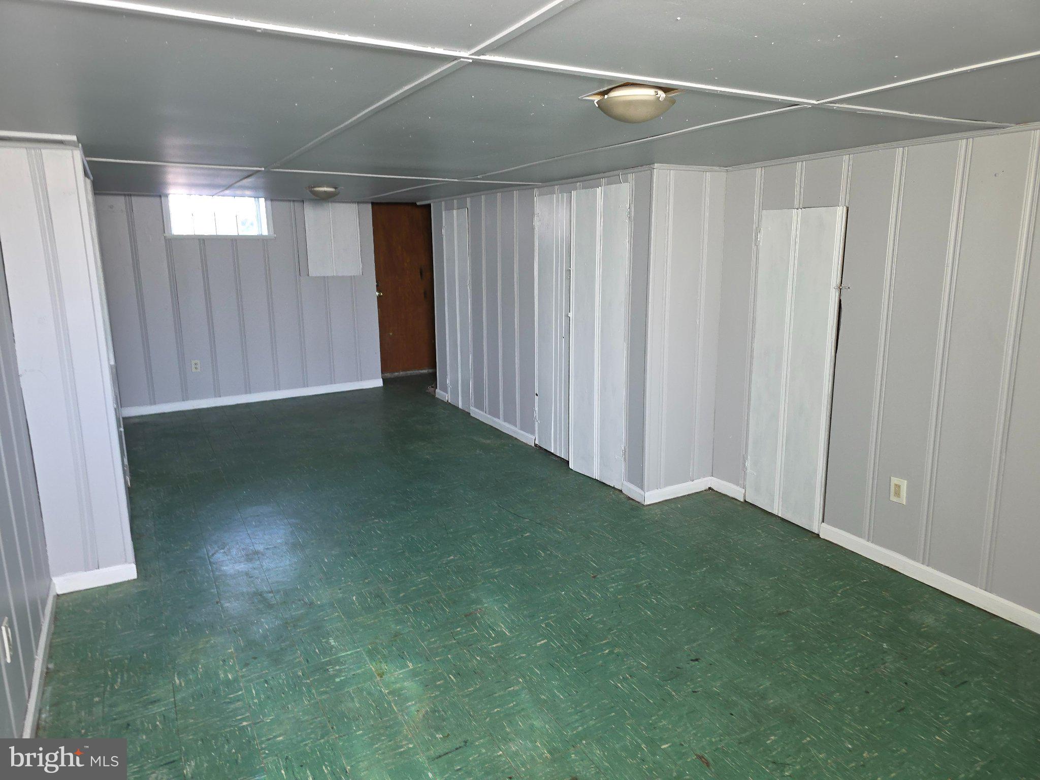 4404 Mountview Road Baltimore, MD 21229 - Photo 21 of 22 Spacious, versatile basement retreat.