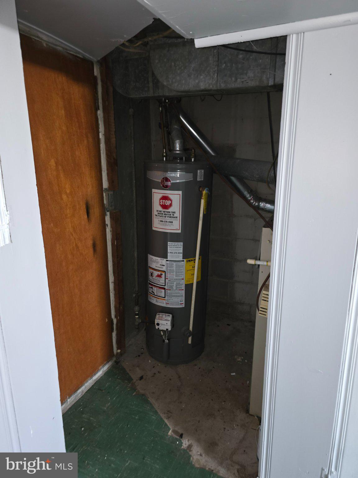 4404 Mountview Road Baltimore, MD 21229 - Photo 22 of 22 Utility space with water heater access.
