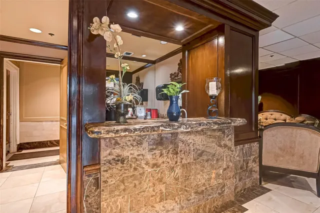 a backyard of a building with barbeque oven