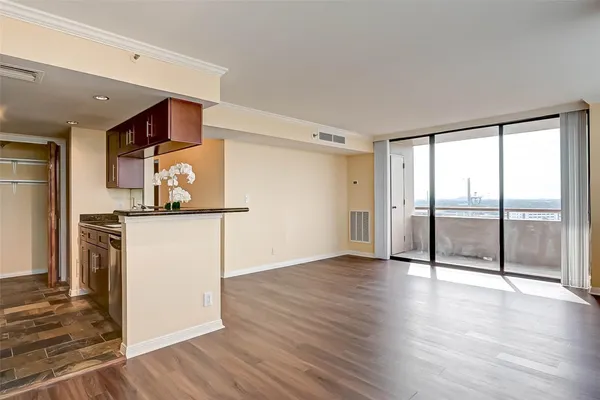 a kitchen with a stove and a microwave