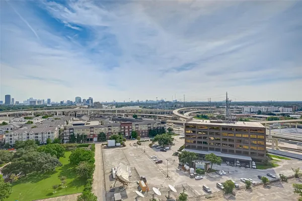 a view of a swimming pool with a lounge chairs
