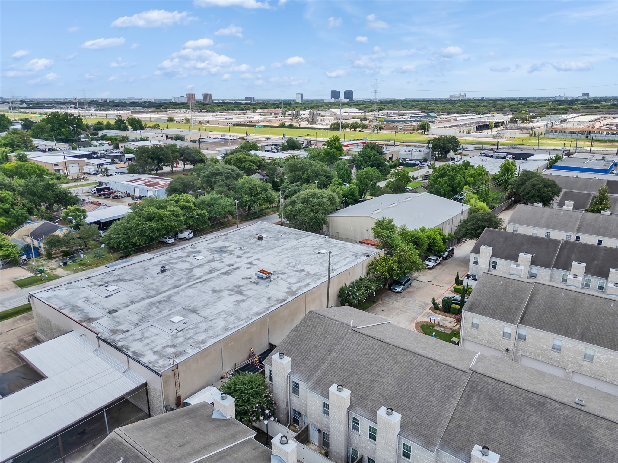 4001 Tanglewilde Street, Unit 605 Houston, TX 77063 - Photo 29 of 29 an aerial view of a city with lots of residential buildings and ocean view