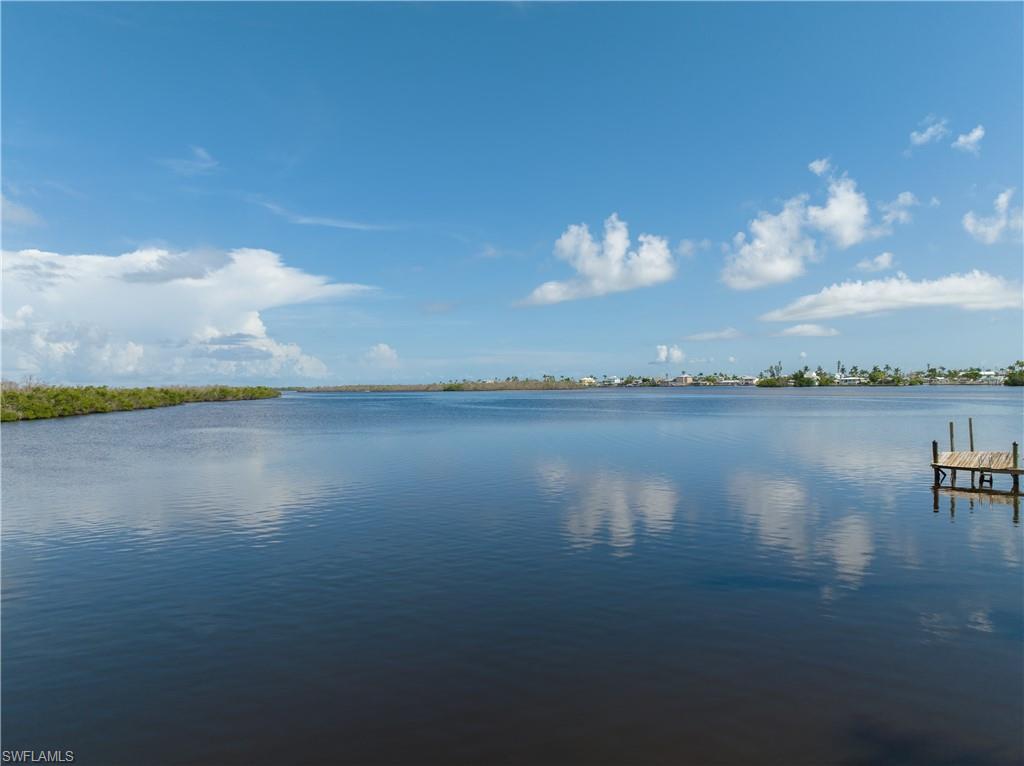a view of a lake from a yard