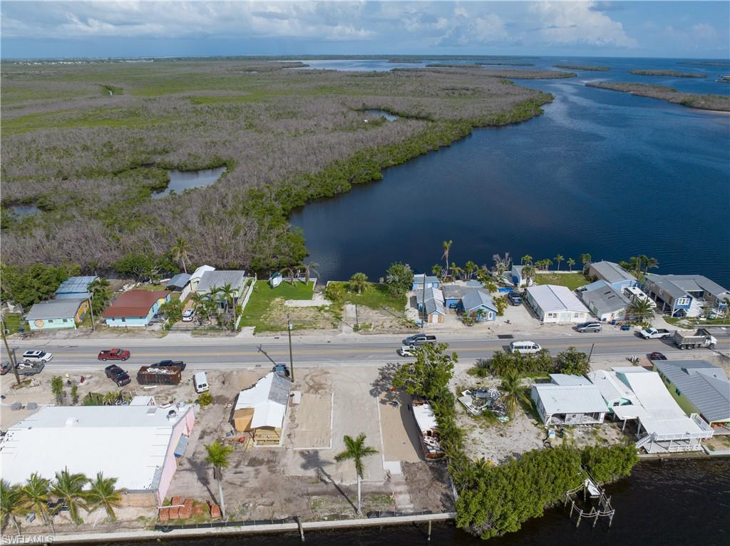 4850 Pine Island Road Bokeelia, FL 33922 - Photo 15 of 24 a view of lake and mountain