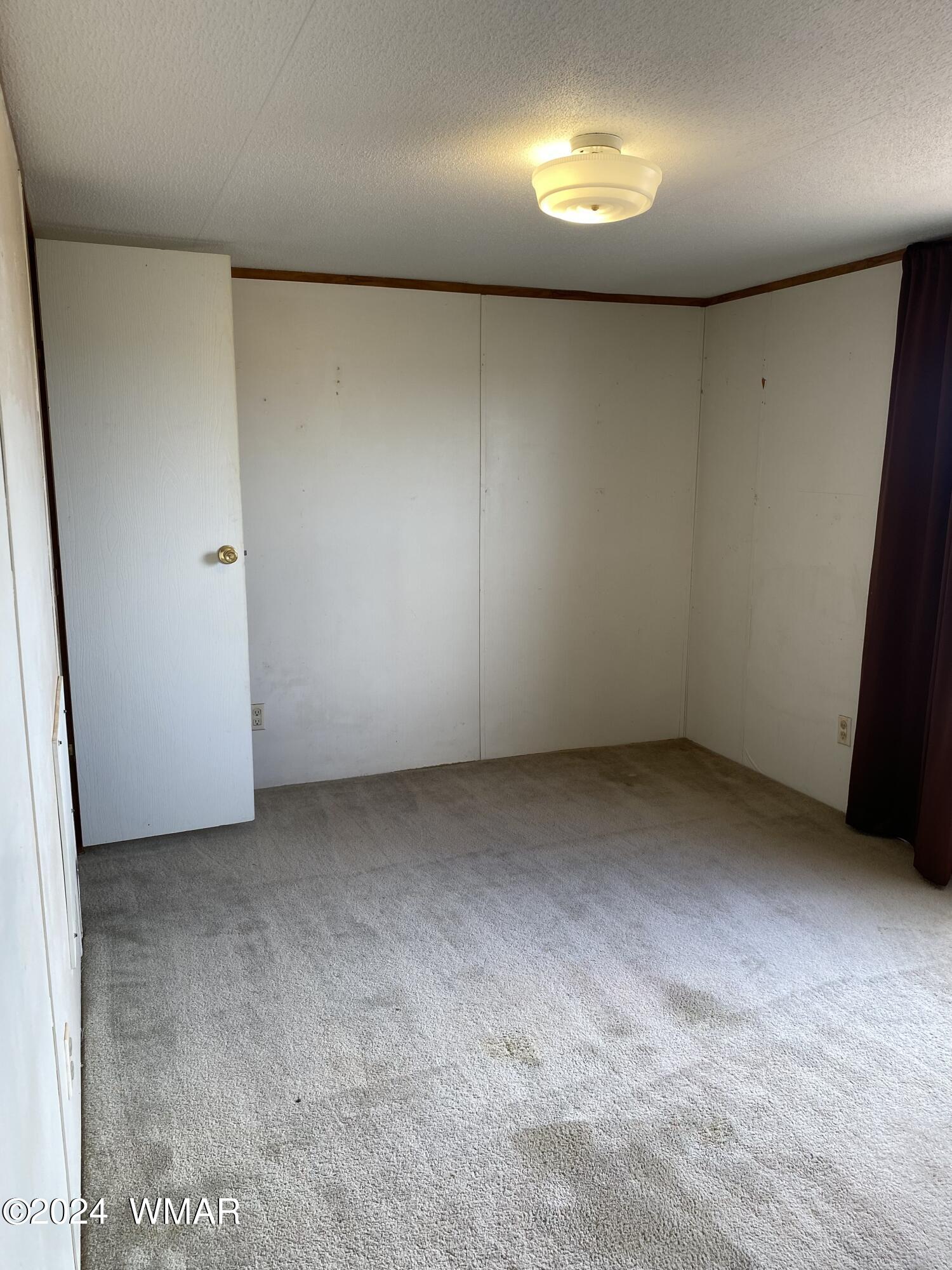 5149 Pj Ranch Road Snowflake, AZ 85937 - Photo 36 of 44 an empty room with a window