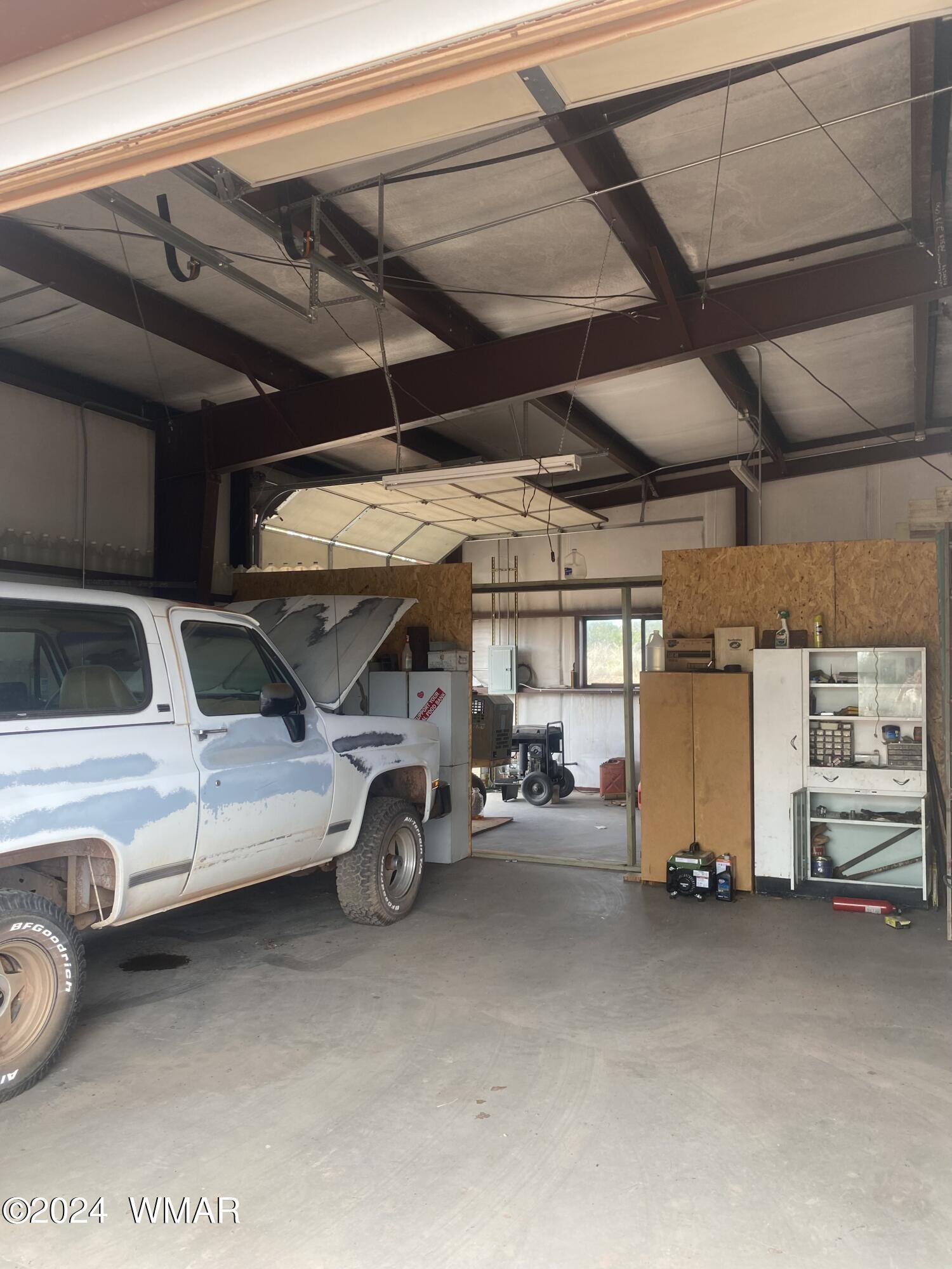 5149 Pj Ranch Road Snowflake, AZ 85937 - Photo 5 of 44 a view of parking garage with cars