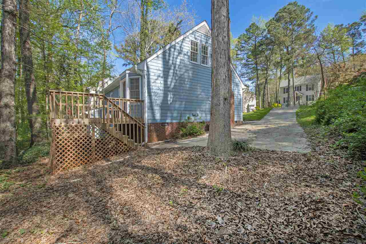 6909 Sandringham Drive Raleigh, NC 27613 - Photo 19 of 24 Side view of home