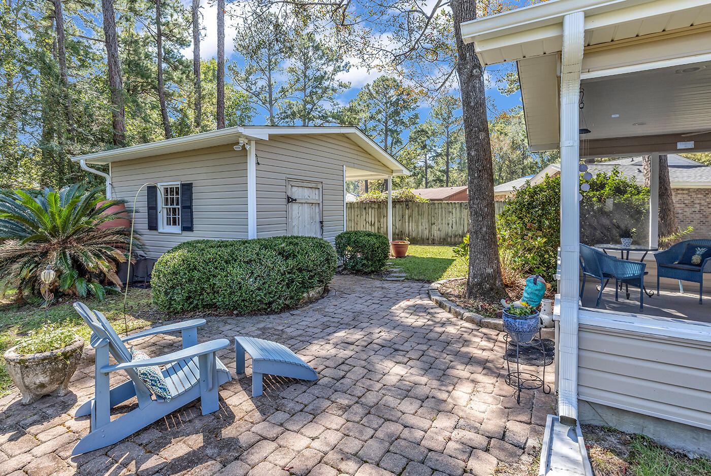 128 Quail Hollow Road Myrtle Beach, SC 29579 - Photo 18 of 22 Paver Patio off Screened Porch