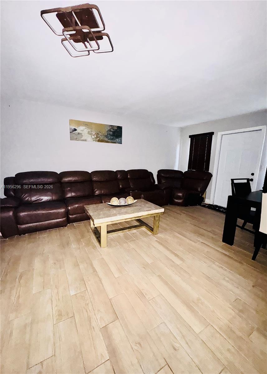 9412 Northwest 39th Street Sunrise, FL 33351 - Photo 18 of 23 a living room with furniture