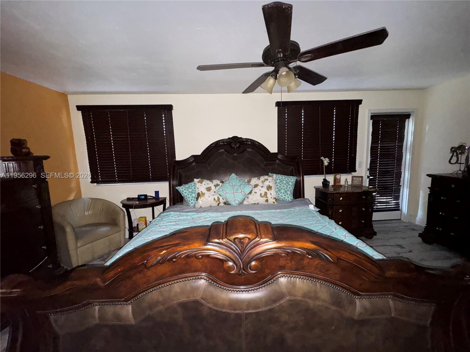 9412 Northwest 39th Street Sunrise, FL 33351 - Photo 10 of 23 a living room with furniture and a ceiling fan