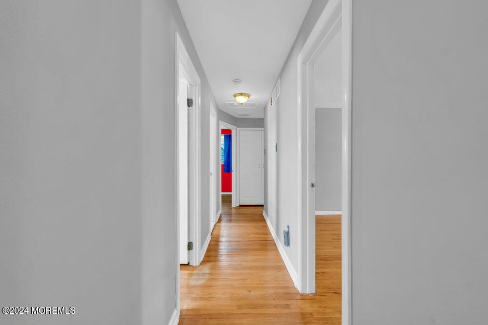 6 Firethorne Road Cherry Hill, NJ 08003 - Photo 28 of 52 a view of a hallway with wooden floor and entryway