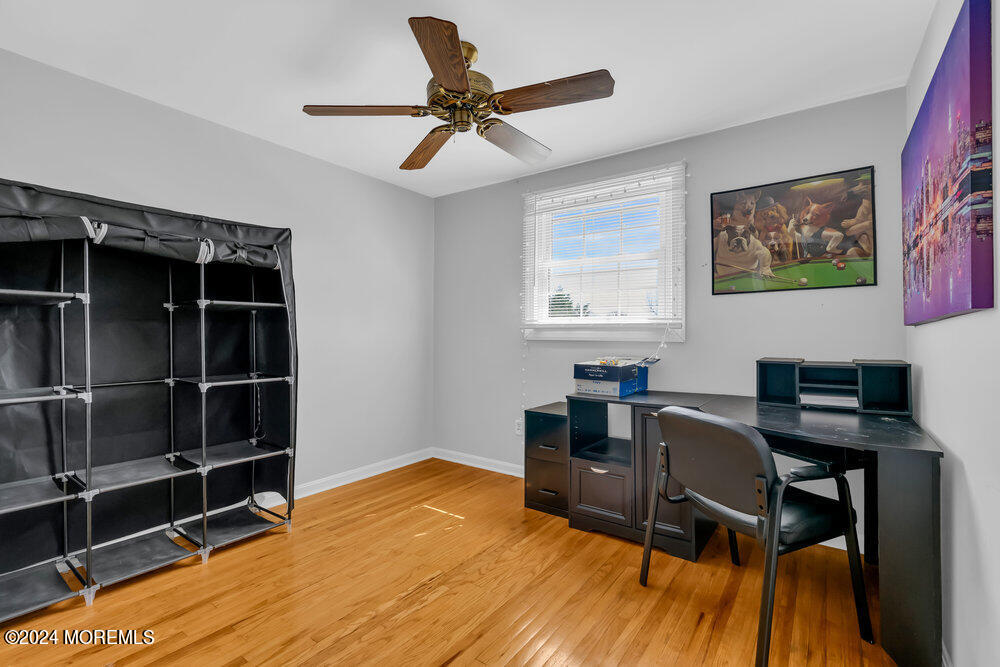 6 Firethorne Road Cherry Hill, NJ 08003 - Photo 29 of 52 a workspace with furniture wall paintings and a window