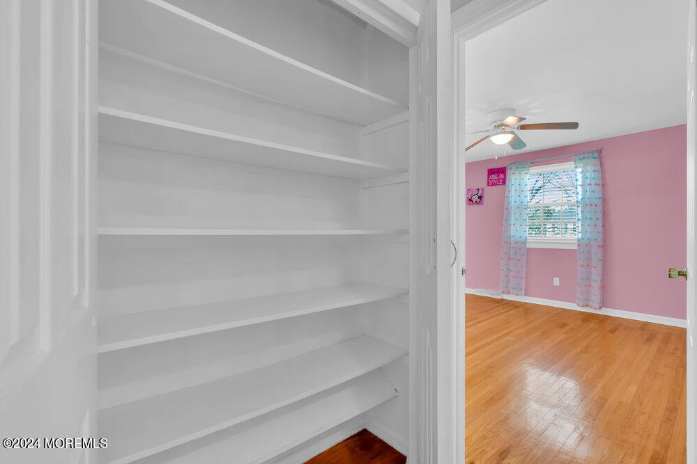 6 Firethorne Road Cherry Hill, NJ 08003 - Photo 32 of 52 a view of a room with shelves on the wall