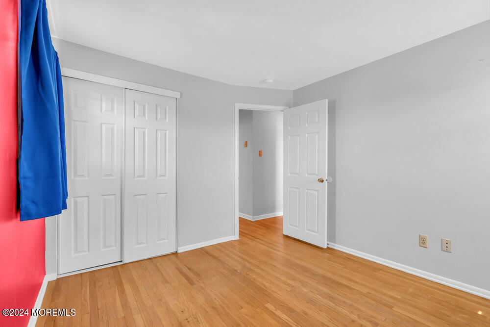 6 Firethorne Road Cherry Hill, NJ 08003 - Photo 35 of 52 a view of empty room with wooden floor