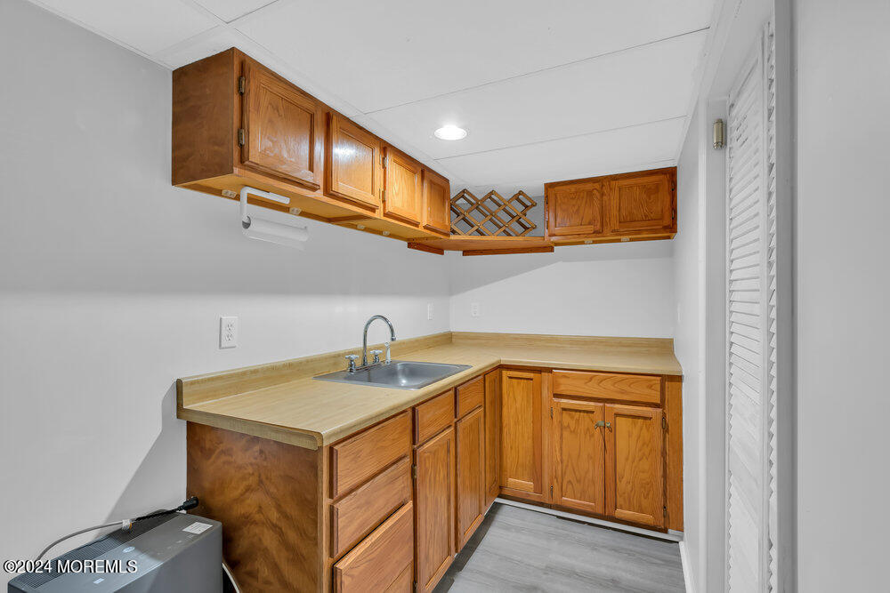 6 Firethorne Road Cherry Hill, NJ 08003 - Photo 41 of 52 a utility room with stainless steel appliances granite countertop a sink and dishwasher