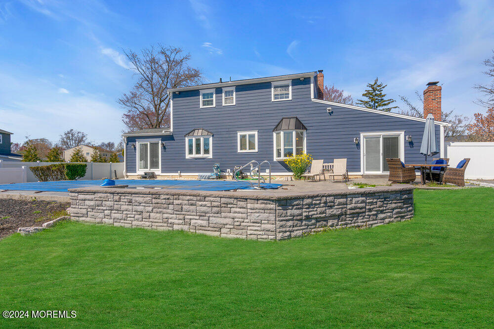 6 Firethorne Road Cherry Hill, NJ 08003 - Photo 47 of 52 a front view of a house with a garden