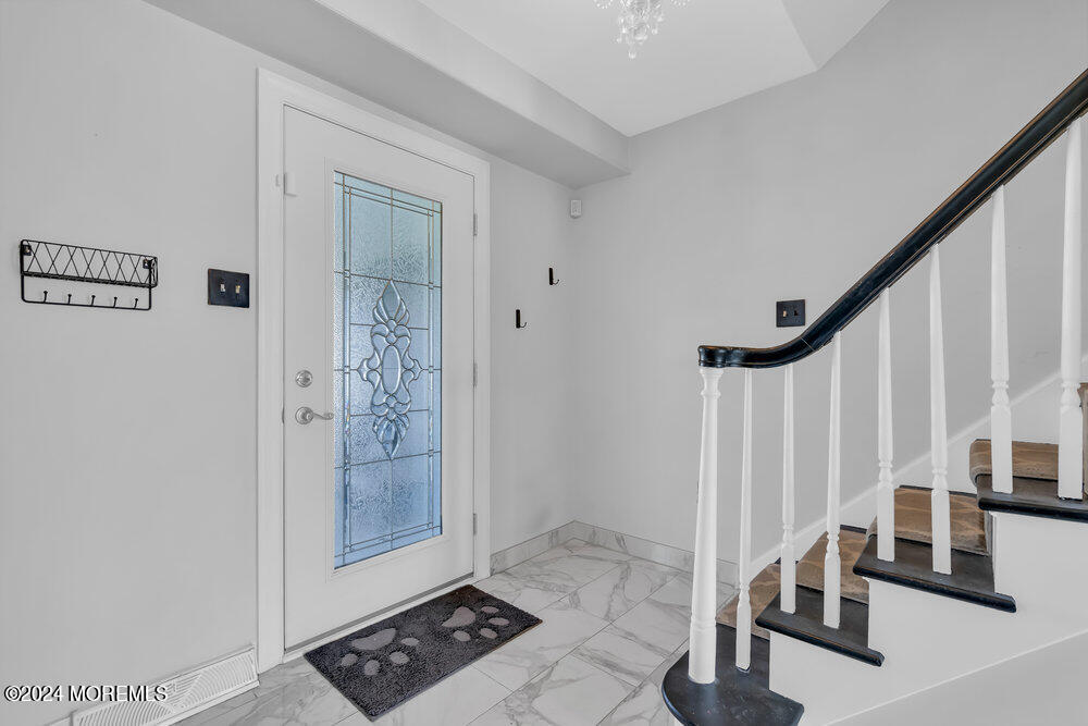 6 Firethorne Road Cherry Hill, NJ 08003 - Photo 6 of 52 a view of an entryway with staircase
