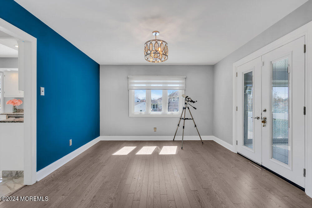 6 Firethorne Road Cherry Hill, NJ 08003 - Photo 9 of 52 a view of empty room with wooden floor