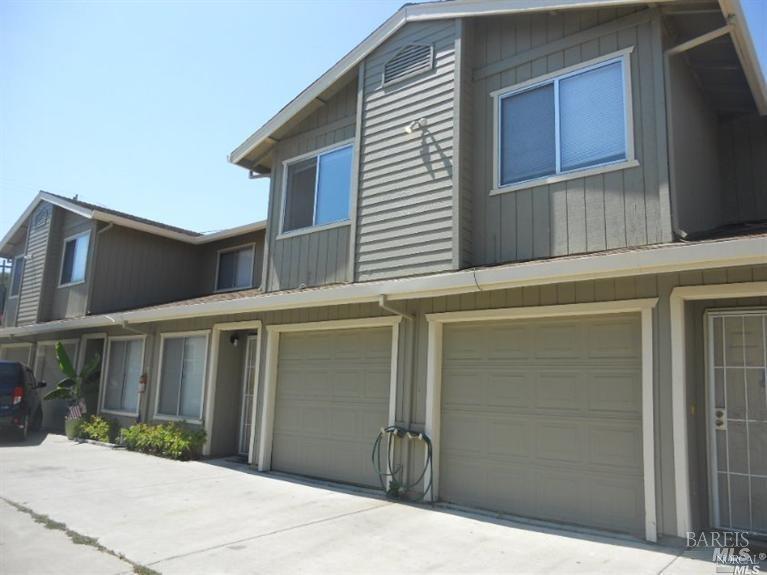 420 Montezuma Street, Unit C Rio Vista, CA 94571 - Photo 1 of 7 a backyard of a house