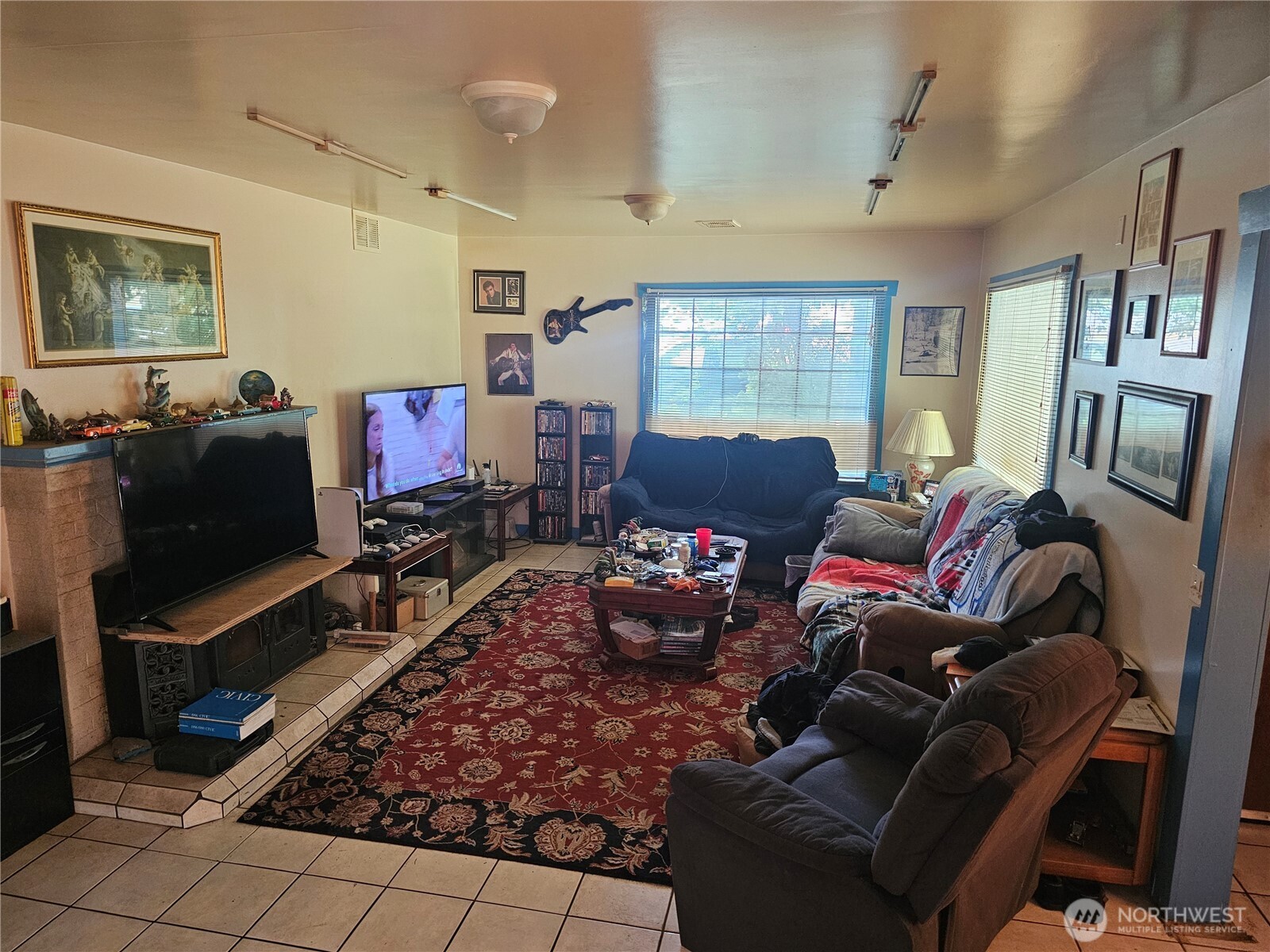 5390 Highway 12 Elma, WA 98541 - Photo 4 of 12 a living room with furniture a flat screen tv and a window