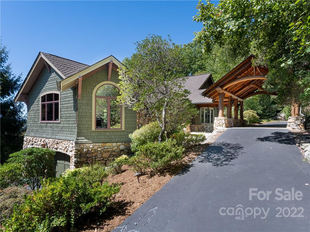 168 Pinkerton Corner Fairview, NC 28730 - Photo 1 of 48 a front view of a house with a yard and outdoor space