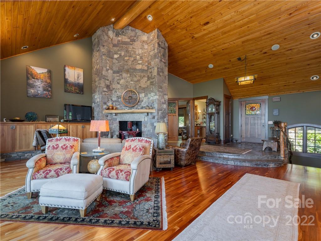 168 Pinkerton Corner Fairview, NC 28730 - Photo 11 of 48 a living room with fireplace furniture and a fireplace