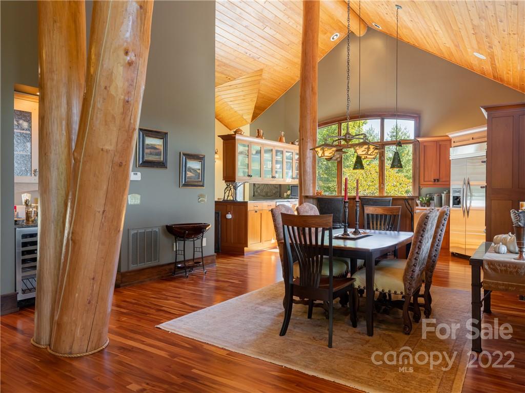 168 Pinkerton Corner Fairview, NC 28730 - Photo 14 of 48 a view of a dining room with furniture window and wooden floor