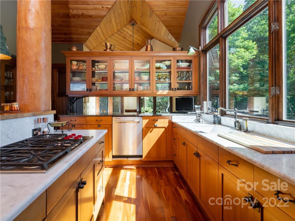168 Pinkerton Corner Fairview, NC 28730 - Photo 15 of 48 a kitchen with stove and cabinets