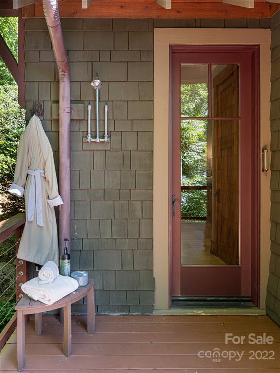 168 Pinkerton Corner Fairview, NC 28730 - Photo 25 of 48 a couple of table and chair in front of door