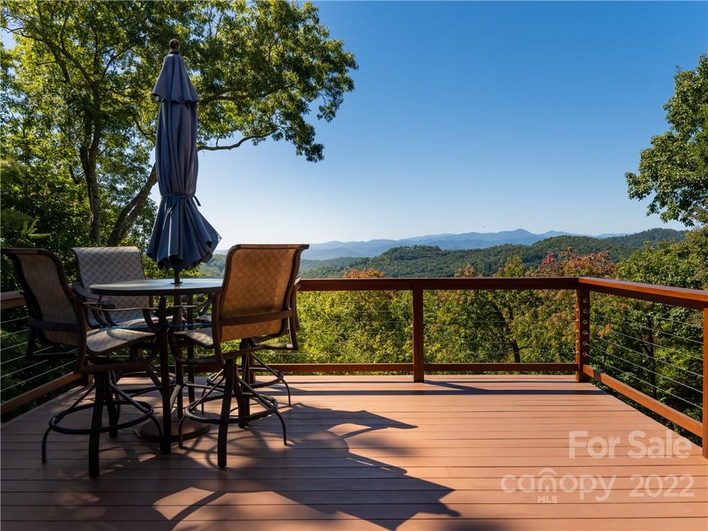 168 Pinkerton Corner Fairview, NC 28730 - Photo 44 of 48 a view of a chairs and table in the balcony