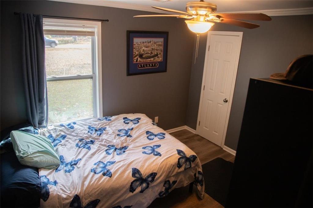 571 Oak Grove Road McDonough, GA 30253 - Photo 23 of 31 a bedroom with a bed and a window