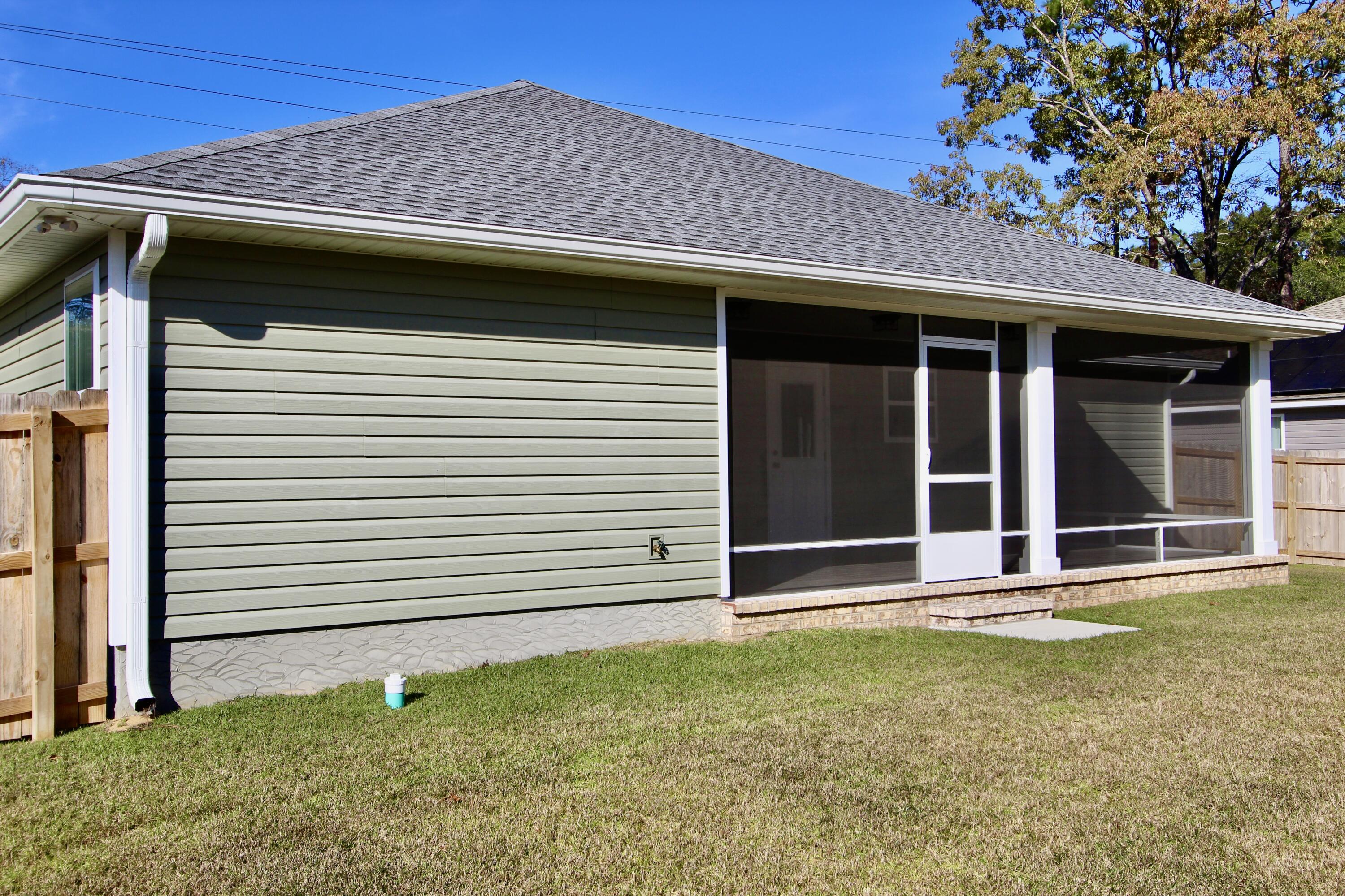 6447 Georgia Avenue Crestview, FL 32539 - Photo 36 of 36 a front view of a house with a yard