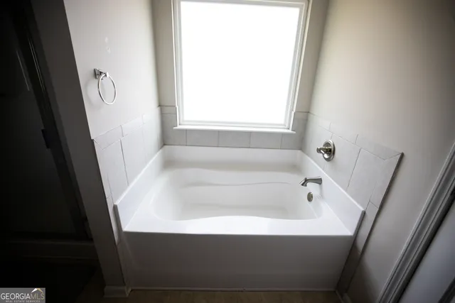a bathroom with a bathtub