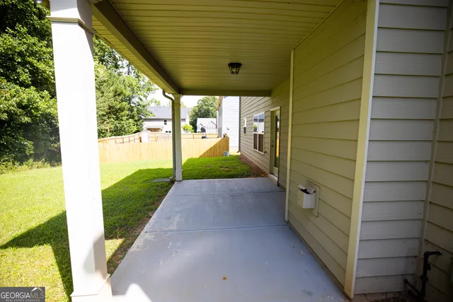a view of porch with seating space